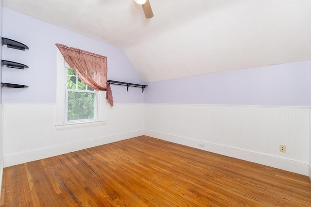 13 Mullin Ave, Quincy, MA 02169 - additional living space with vaulted ceiling, wood finished floors, a ceiling fan, and wainscoting