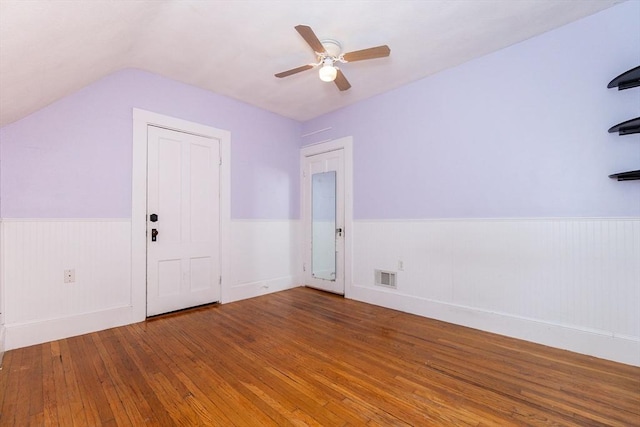 13 Mullin Ave, Quincy, MA 02169 - bonus room with wainscoting, hardwood / wood-style flooring, ceiling fan, and vaulted ceiling