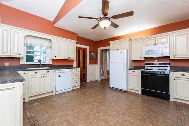 13 Mullin Ave, Quincy, MA 02169 - kitchen featuring white appliances, a ceiling fan, dark countertops, and wainscoting