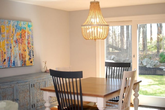 dining room featuring a notable chandelier