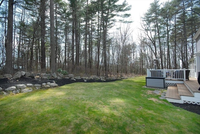 view of yard featuring a deck