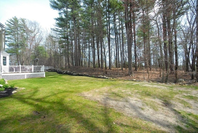 view of yard with a deck