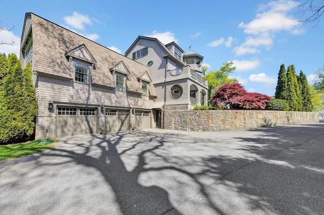 view of front of home with a garage