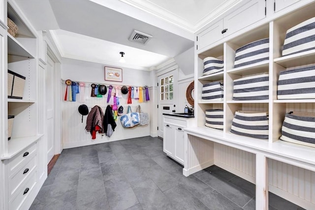 interior space featuring crown molding