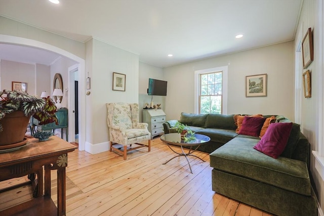 5 Pleasant St, Bourne, MA 02532 - living area with light wood-style floors, arched walkways, ornamental molding, and recessed lighting