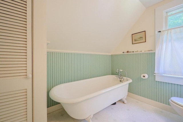 5 Pleasant St, Bourne, MA 02532 - full bath featuring a soaking tub, wainscoting, and lofted ceiling