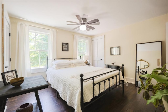 5 Pleasant St, Bourne, MA 02532 - bedroom with dark wood-style floors, a closet, and ceiling fan