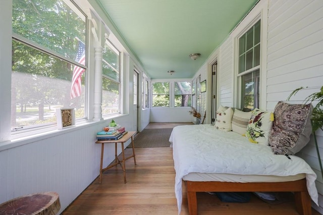 5 Pleasant St, Bourne, MA 02532 - bedroom featuring wood finished floors and wood walls