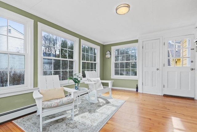 sunroom / solarium with a baseboard radiator