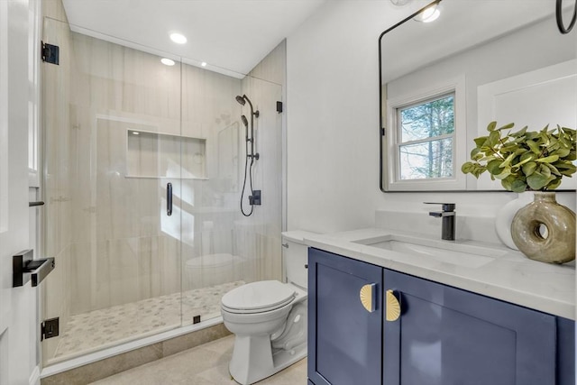 full bath with recessed lighting, toilet, a stall shower, vanity, and tile patterned flooring