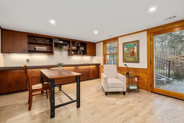 dining area with a wainscoted wall, recessed lighting, light wood-style floors, and visible vents