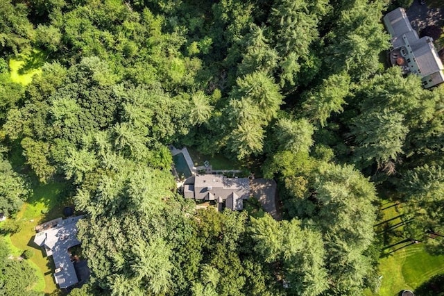 aerial view featuring a view of trees