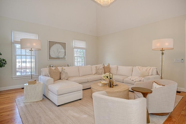 living room featuring light hardwood / wood-style flooring and a wealth of natural light