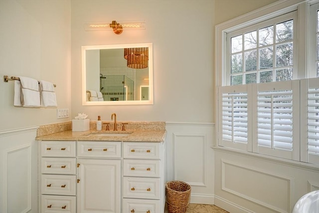 bathroom with vanity and walk in shower