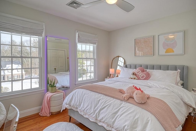 bedroom featuring ceiling fan and hardwood / wood-style floors