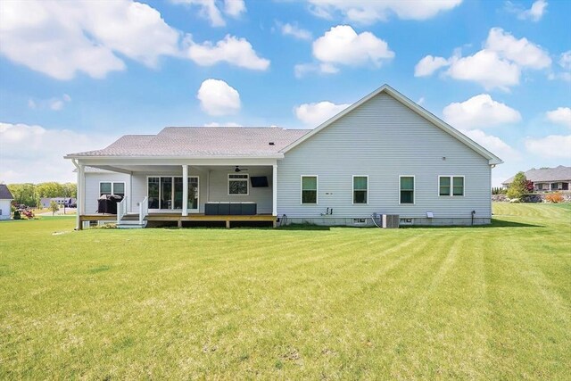 2 Turning Leaf Rd, Ludlow, MA 01056 - back of property featuring a ceiling fan, a yard, central AC unit, and a deck