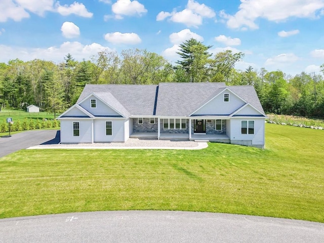 2 Turning Leaf Rd, Ludlow, MA 01056 - view of front facade with a front yard and a porch