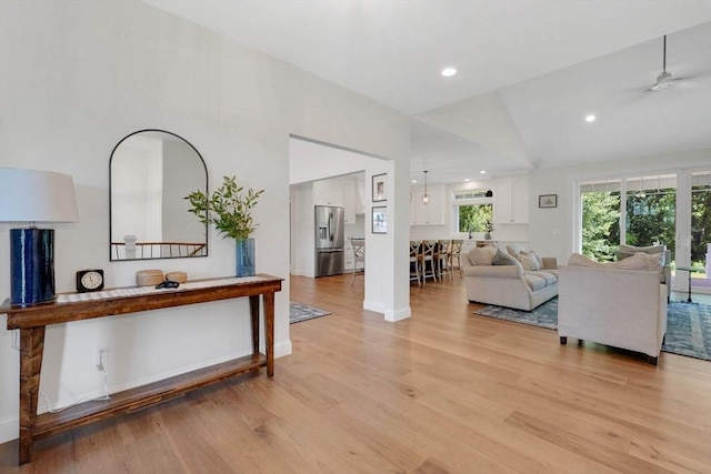 2 Turning Leaf Rd, Ludlow, MA 01056 - living room featuring light wood finished floors, vaulted ceiling, a ceiling fan, baseboards, and recessed lighting