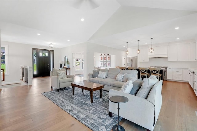 2 Turning Leaf Rd, Ludlow, MA 01056 - living area with light wood-style floors, vaulted ceiling, recessed lighting, and ceiling fan