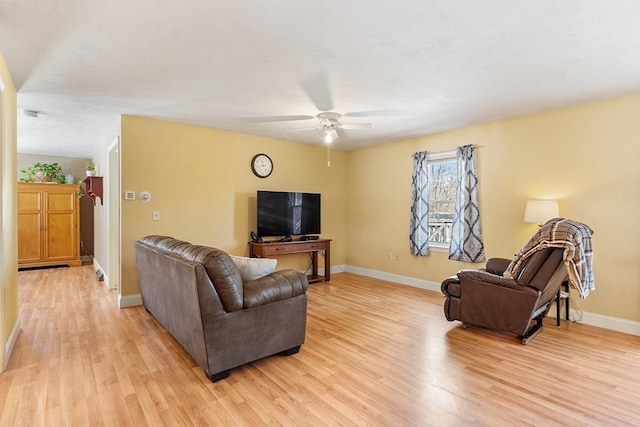 40 Flaggler Rd, Leominster, MA 01453 - living area featuring light wood-style flooring, baseboards, and a ceiling fan