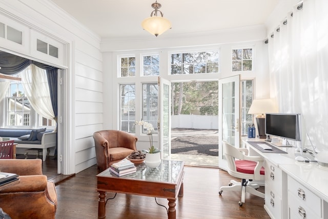 home office with crown molding and dark hardwood / wood-style flooring