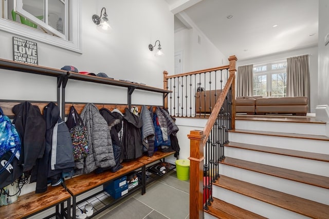 stairs featuring tile flooring