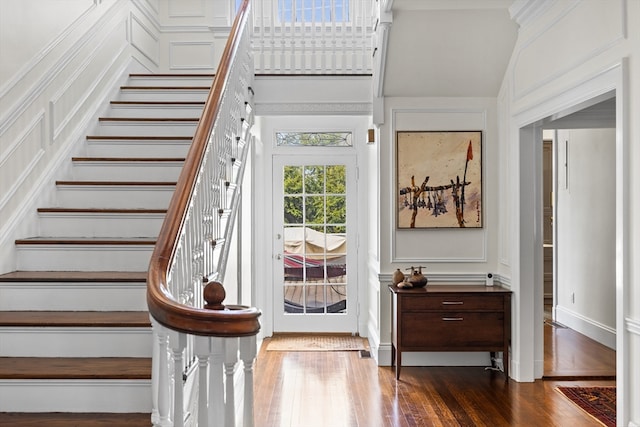 stairway featuring dark hardwood / wood-style floors