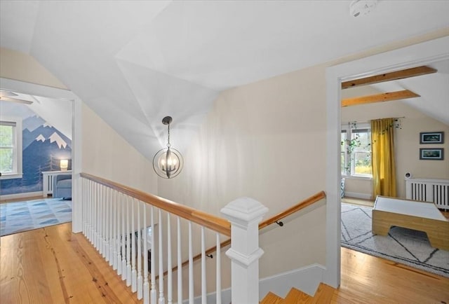 44 Prospect Rd, Plympton, MA 02367 - hall with lofted ceiling, an upstairs landing, wood finished floors, and radiator heating unit