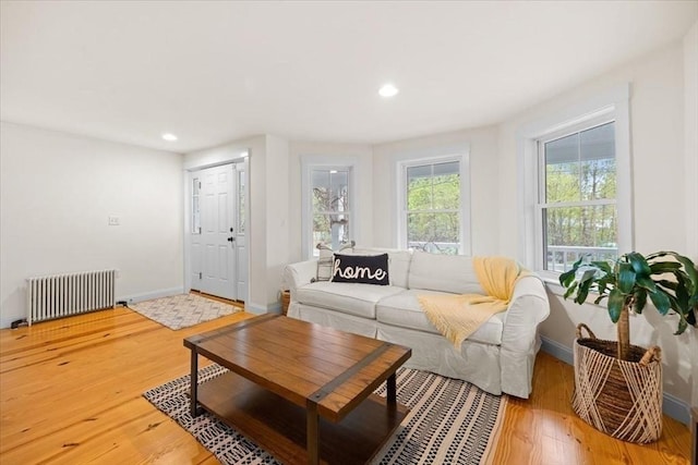 44 Prospect Rd, Plympton, MA 02367 - living area with radiator heating unit, baseboards, light wood-type flooring, and recessed lighting