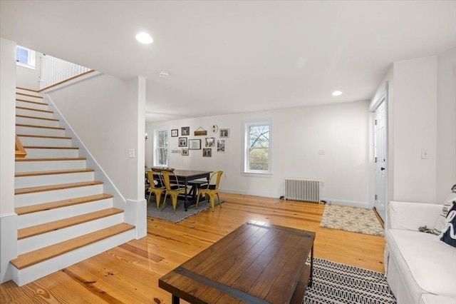 44 Prospect Rd, Plympton, MA 02367 - living area with radiator, light wood finished floors, stairway, recessed lighting, and baseboards