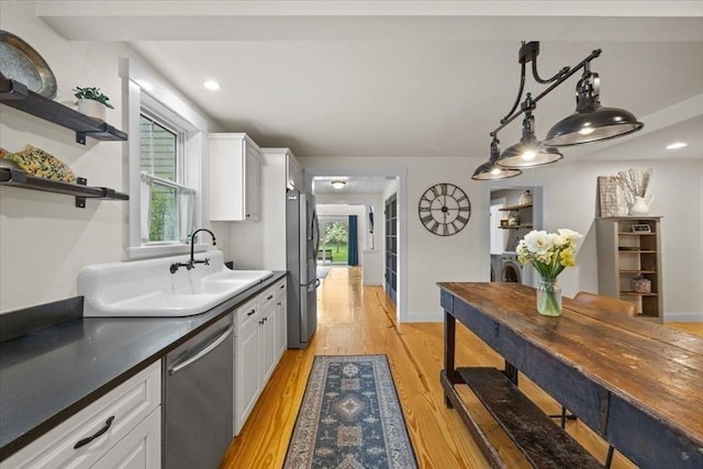 44 Prospect Rd, Plympton, MA 02367 - kitchen featuring appliances with stainless steel finishes, white cabinetry, a sink, light wood-type flooring, and open shelves