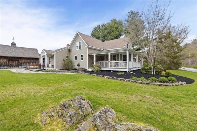 44 Prospect Rd, Plympton, MA 02367 - rear view of house with covered porch and a lawn