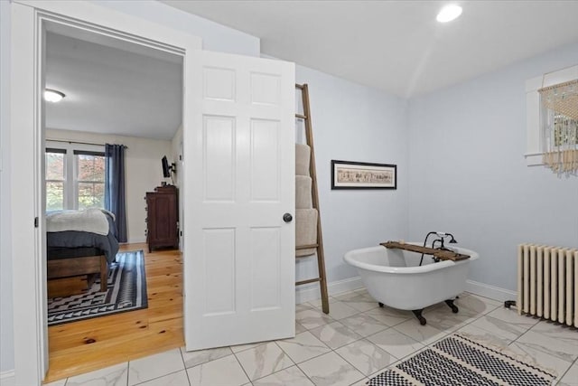 44 Prospect Rd, Plympton, MA 02367 - full bath featuring radiator heating unit, marble look tile flooring, a freestanding tub, baseboards, and recessed lighting