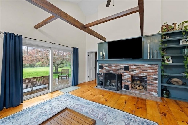 44 Prospect Rd, Plympton, MA 02367 - living room with hardwood / wood-style flooring, high vaulted ceiling, a brick fireplace, beamed ceiling, and a ceiling fan