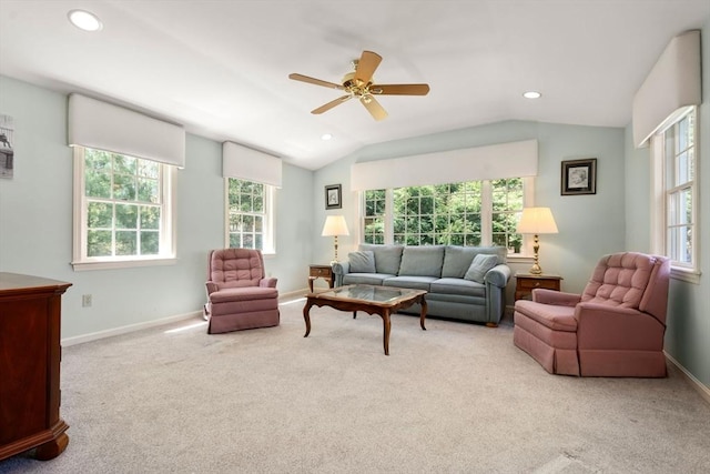 living area with plenty of natural light, carpet, baseboards, lofted ceiling, and recessed lighting