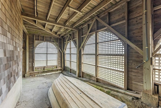 miscellaneous room with vaulted ceiling with beams and wood ceiling