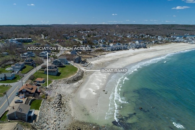 drone / aerial view with a view of the beach and a water view