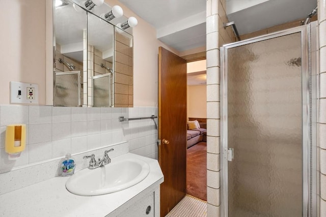 50 Thompson St, Dedham, MA 02026 - bathroom featuring a shower stall and vanity