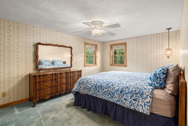 50 Thompson St, Dedham, MA 02026 - carpeted bedroom with a ceiling fan