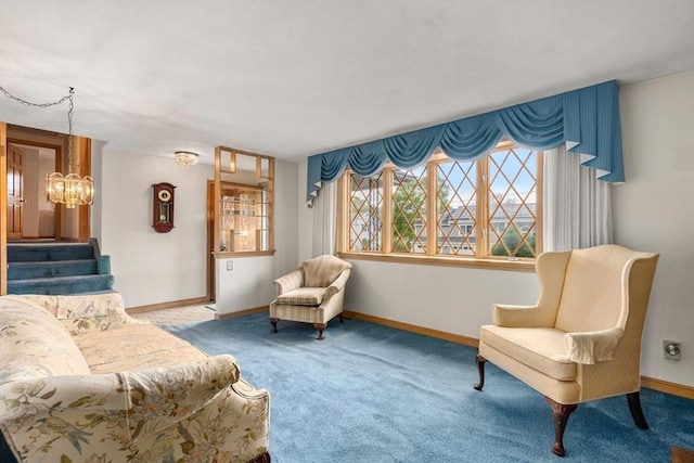 50 Thompson St, Dedham, MA 02026 - living area with a chandelier, carpet, baseboards, and stairway