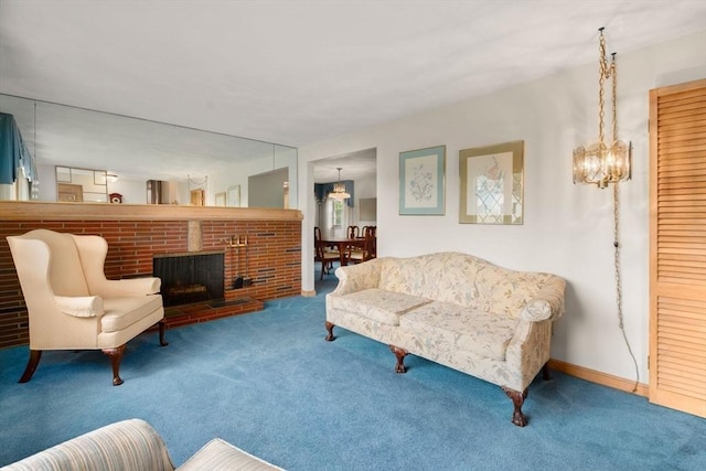 50 Thompson St, Dedham, MA 02026 - carpeted living room with a chandelier and a fireplace
