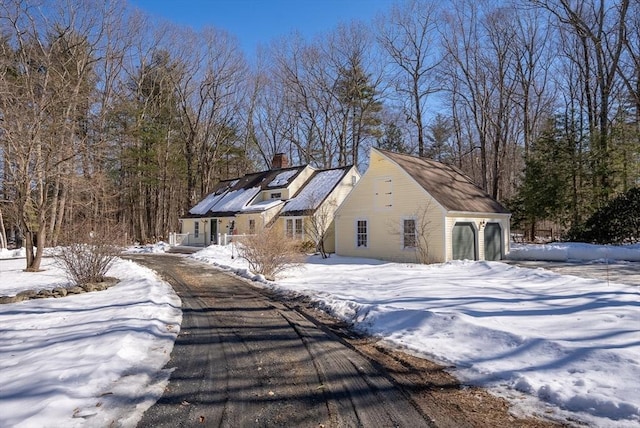 view of front of property featuring a chimney