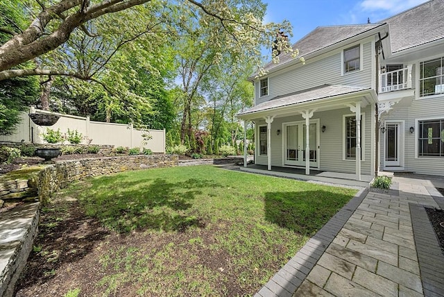 view of yard with a porch