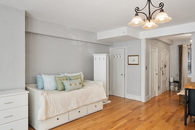 250 Beacon Unit 1B, Boston, MA 02116 - bedroom with a chandelier and light wood finished floors