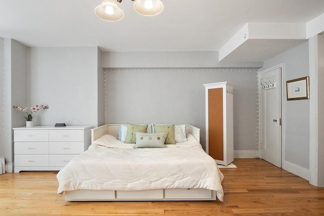 250 Beacon Unit 1B, Boston, MA 02116 - bedroom featuring light wood finished floors and baseboards