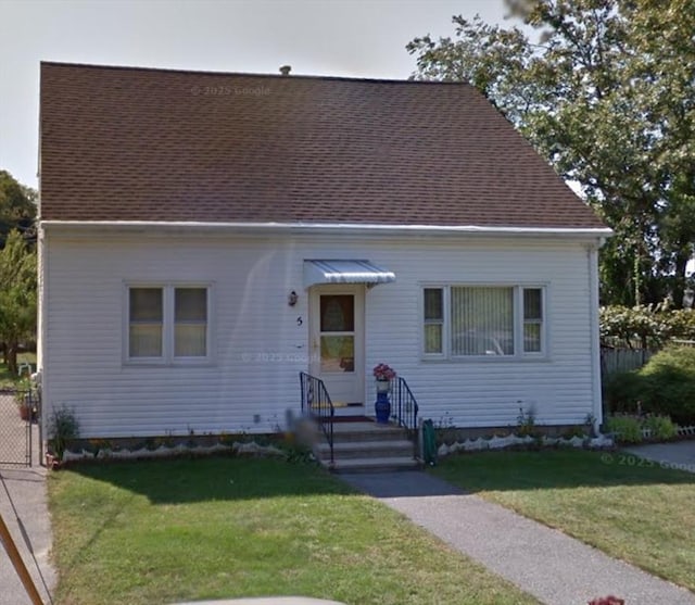 5 Wayland St, Fall River, MA 02720 - view of front facade featuring a shingled roof
