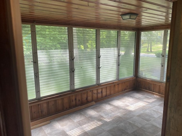 107 Rollins St, Springfield, MA 01109 - unfurnished sunroom with plenty of natural light, wooden ceiling, and wood walls