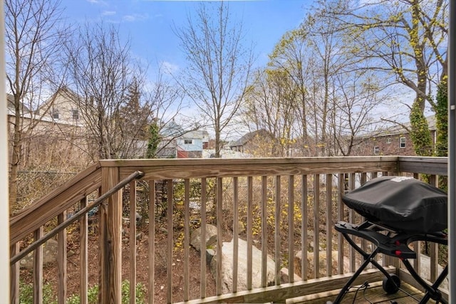 wooden terrace with grilling area
