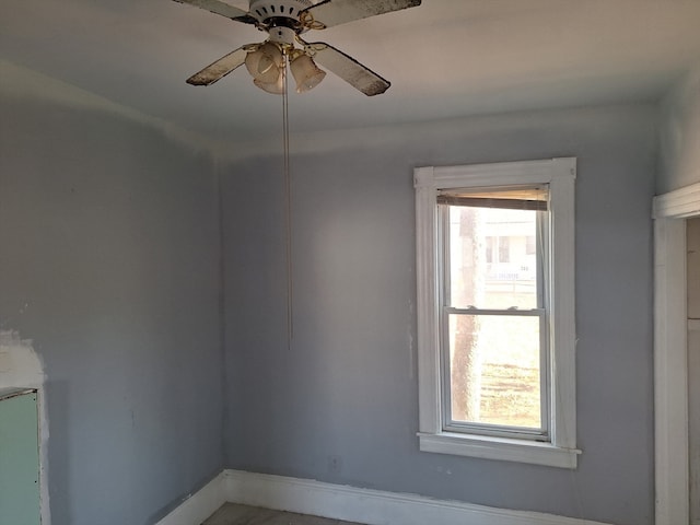 unfurnished room with plenty of natural light and ceiling fan