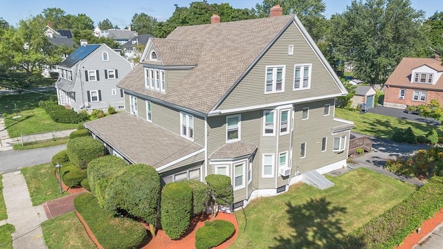 1-3 Fairoaks Ave, Methuen, MA 01844 - view of front of home with a chimney, a residential view, a garage, and a front yard